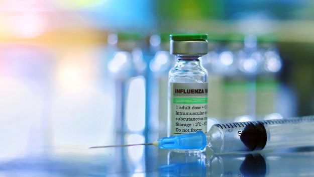 Flu vaccine and needle